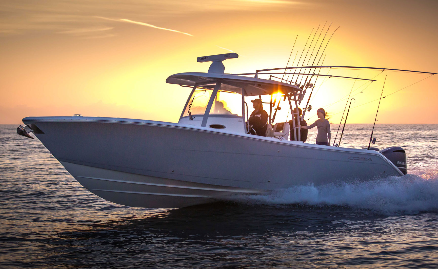 320 CC boat in front of sunset