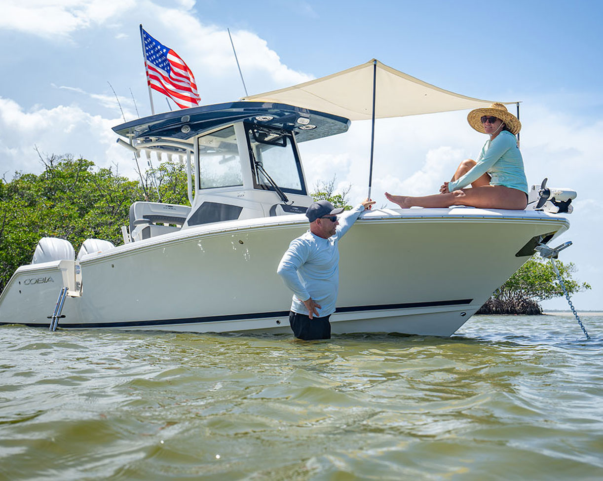 245 CC couple on their boat