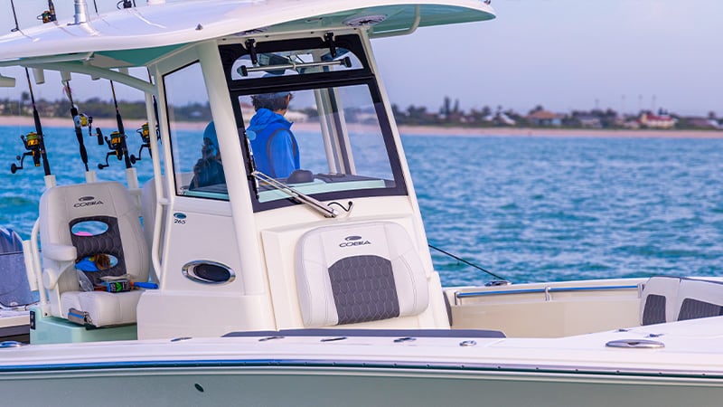 man at wheel of the boat